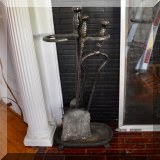 D39. Iron fireplace tools. 